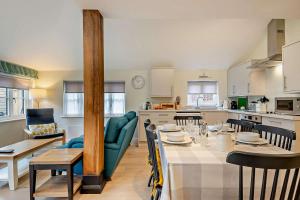 a kitchen and dining room with a table and chairs at 2 Bed in Wickhambrook oc-b30507 in Wickhambrook