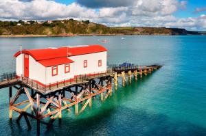 a house on a pier in the water at 2 Bed in Tenby oc-pw1031 in Tenby