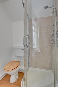 a bathroom with a toilet and a glass shower at 2 Bed in Westward Ho oc-n0987 in Westward Ho +15 photos