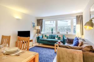a living room with a couch and a table at 2 Bed in St. Ives oc-18stn in St Ives
