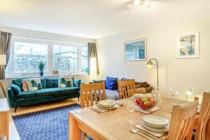 a living room with a table and a couch at 2 Bed in St. Ives oc-18stn in St Ives