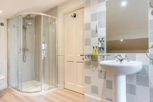 a bathroom with a shower and a sink at 3 Bed in Appersett oc-ds944 in Appersett +25 photos