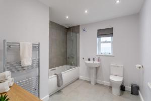 a bathroom with a toilet and a sink and a shower at 3 Bed in Middlesmoor oc-w30366 in Middlesmoor +20 photos