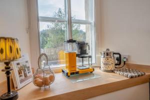 a kitchen counter with a blender on a window sill at 2 Bed in Dunkeld oc-i30992 in Dunkeld