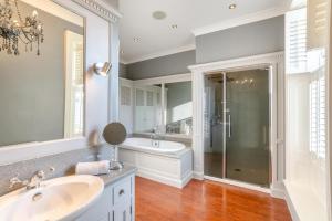 a bathroom with a tub and a sink and a shower at 4 Bed in Beamish oc-o32025 in Beamish +35 photos