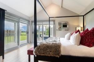 a bedroom with a bed and a large window at 1 Bed in Tunstall oc-p30379 in Tunstall