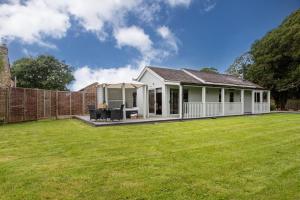a house with a lawn in front of it at 1 Bed in Tunstall oc-p30379 in Tunstall