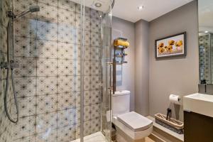 a bathroom with a shower and a toilet and a sink at 2 Bed in Bolam oc-b29967 in Ingleton +17 photos
