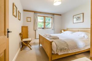 a bedroom with a large bed and a window at 2 Bed in Little Hereford oc-l29580 in Berrington