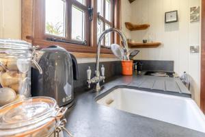 a kitchen counter with a sink and a window at 1 Bed in Bronllys oc-t31949 in Bronllys