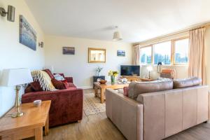 a living room with two couches and a tv at 3 Bed in Goldenbank oc-c29977 in Falmouth