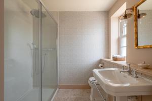 a bathroom with a shower and a sink and a toilet at 3 Bed in Wittersham oc-m27683 in Wittersham +45 photos