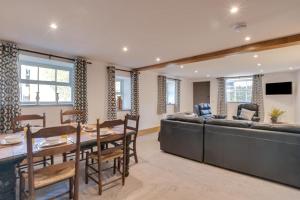 a living room with a table and a couch at 3 Bed in Burtersett oc-ds1043 in Hawes