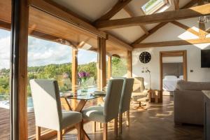 a dining room with a glass table and chairs at 2 Bed in Allendale oc-r29078 in Allendale Town