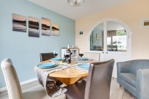 a dining room with a table and chairs at 3 Bed in Lucker oc-nb1938 in Lucker