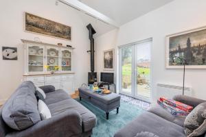 a living room with a couch and a table at 2 Bed in Battle oc-m31780 in Battle