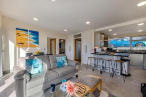 a living room with a couch and a kitchen at 2 Bed in Aberdovey oc-n30627 in Aberdyfi