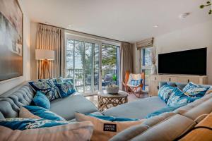 a living room with a couch and a television at 2 Bed in Padstow oc-h29015 in Padstow