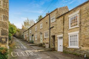 a row of brick houses on a street at 3 Bed in Pickering oc-t33630 in Pickering