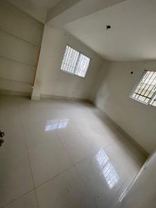 an empty room with two windows and a white floor at Bohio rd in Santo Domingo +2 photos