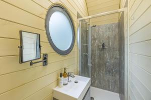a bathroom with a mirror and a sink and a shower at 1 Bed in Upton-upon-Severn oc-t30854 in Upton upon Severn +23 photos