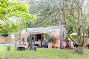 a tiny house in a garden with a patio at 1 Bed in Upton-upon-Severn oc-t30854 in Upton upon Severn