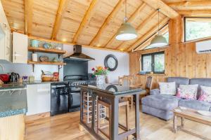 a kitchen and living room in a tiny house at 1 Bed in Whitbourne oc-s32935 in Whitbourne