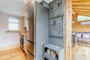 a kitchen and living room with a refrigerator at 1 Bed in Whitbourne oc-s32935 in Whitbourne +13 photos