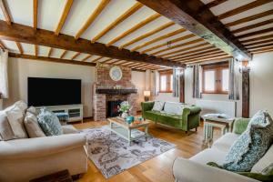 a living room filled with furniture and a fireplace at 4 Bed in Heywood oc-t29040 in Westbury