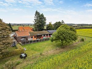 an aerial view of a farm with a field of flowers at 4 Bed in Litcham oc-h30106 in Litcham