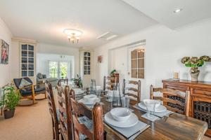 a dining room with a wooden table and chairs at 3 Bed in Longtown oc-h30069 in Longtown