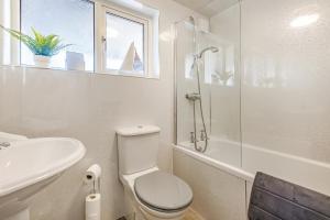 a bathroom with a toilet and a sink and a shower at 3 Bed in Longtown oc-h30069 in Longtown +22 photos