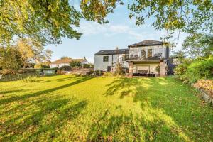 a large yard in front of a house at 3 Bed in Longtown oc-h30069 in Longtown