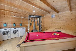 a pool table in a room with washing machines at 4 Bed in Retorrick Mill oc-w28897 in Saint Mawgan