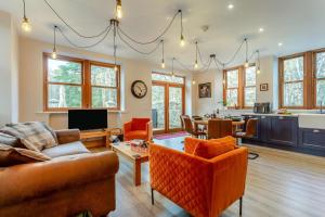 a living room with a couch and a table at 3 Bed in Huntly oc-g31733 in Huntly