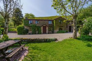 a house with a picnic table in front of it at 7 Bed in Talgarth oc-h30349 in Talgarth
