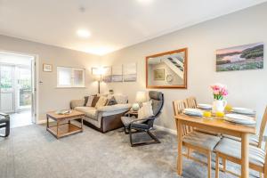 a living room with a couch and a table at 2 Bed in Grasmere oc-ld175 in Grasmere +8 photos