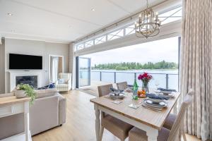 a living room with a table and a couch at 2 Bed in Tallington oc-b32208 in Barholm