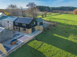 an aerial view of a house in a field at 1 Bed in Llanover oc-y30114 in Llanover