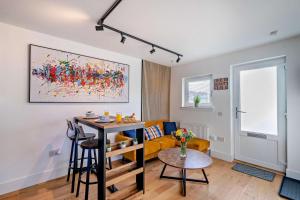 a living room with a couch and a table at 1 Bed in St. Andrews oc-c30132 in St. Andrews