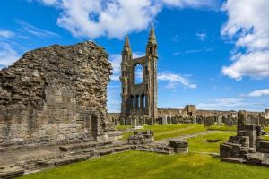 an old ruin of a castle with a tower at 1 Bed in St. Andrews oc-c30132 in St. Andrews +13 photos