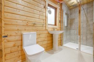 a bathroom with a toilet and a sink at 3 Bed in Llanddulas oc-r27872 in Llanddulas +12 photos