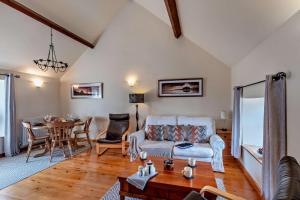 a living room with a couch and a table at 2 Bed in Belford oc-c29288 in Fenham