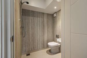 a small bathroom with a toilet and a shower at 3 Bed in Ilfracombe oc-s29585 in Ilfracombe +13 photos