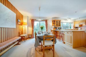 a kitchen with a table and a dining room at 3 Bed in North Connel oc-a29963 in Connel