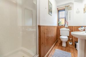 a bathroom with a shower and a toilet and a sink at 2 Bed in Devils Bridge oc-d29575 in Devils Bridge +22 photos