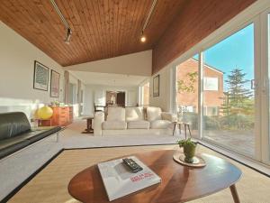 a living room with a couch and a table at 5 Bed in Tealby oc-t30618 in Tealby