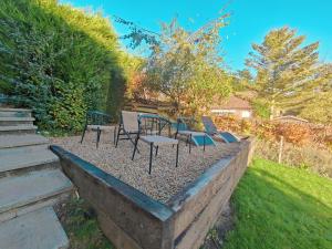 a group of chairs and tables in a yard at 5 Bed in Tealby oc-t30618 in Tealby