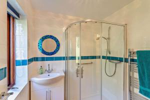 a bathroom with a shower and a sink at 5 Bed in Dymchurch oc-w30161 in Dymchurch +22 photos
