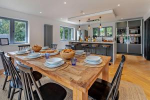 a dining room with a wooden table with chairs at 4 Bed in Wadebridge oc-l30127 in Wadebridge